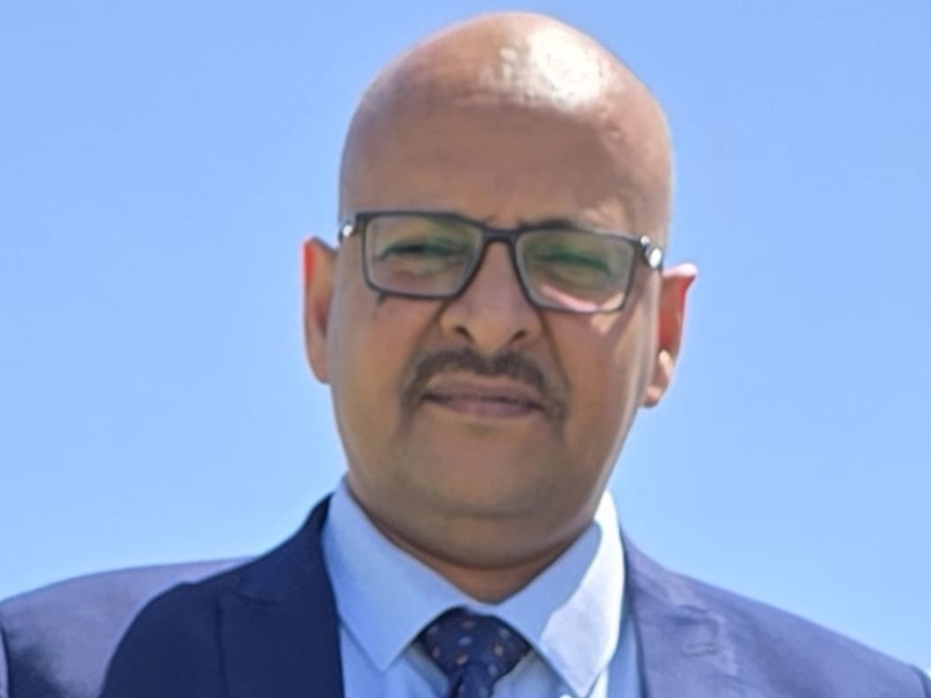 Submitted portrait of a person; identity and role not verified